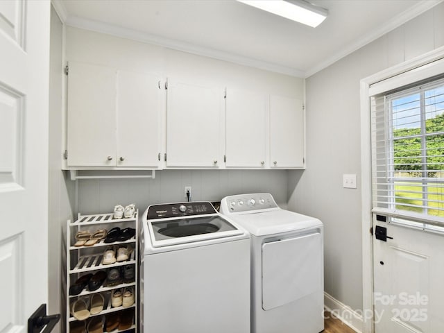2315 Lawton Bluff Rd, Charlotte, NC 28226 - laundry area with cabinet space, washer and clothes dryer, and crown molding