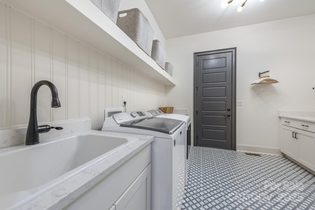 1445 Cherry Laurel Dr, Waxhaw, NC 28173 - clothes washing area featuring independent washer and dryer and baseboards