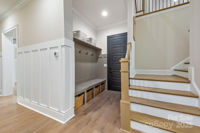 1445 Cherry Laurel Dr, Waxhaw, NC 28173 - mudroom with ornamental molding, wood finished floors, and recessed lighting