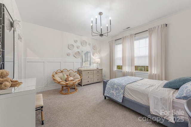 1445 Cherry Laurel Dr, Waxhaw, NC 28173 - bedroom featuring a chandelier, carpet flooring, and a wainscoted wall