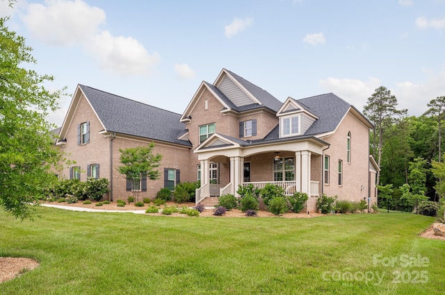 1445 Cherry Laurel Dr, Waxhaw, NC 28173 - craftsman-style house with brick siding, covered porch, and a front yard