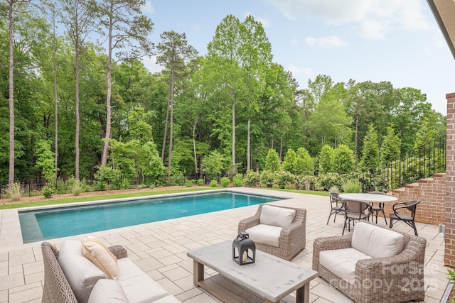 1445 Cherry Laurel Dr, Waxhaw, NC 28173 - view of pool featuring an outdoor hangout area, a patio, and fence