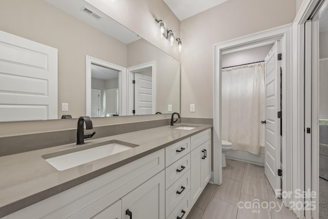 1445 Cherry Laurel Dr, Waxhaw, NC 28173 - full bath with double vanity and a shower with curtain