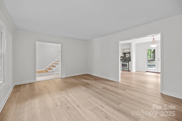 6713 William Harry Ct, Charlotte, NC 28211 - unfurnished room with stairway, light wood-style flooring, ornamental molding, and baseboards