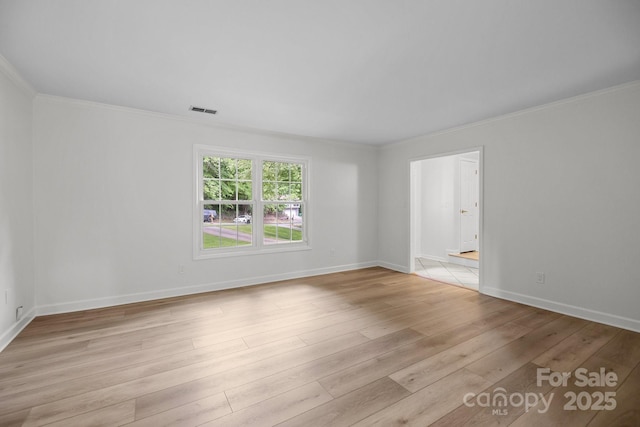 6713 William Harry Ct, Charlotte, NC 28211 - unfurnished room featuring light wood finished floors, crown molding, and baseboards