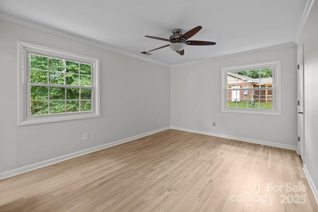 6713 William Harry Ct, Charlotte, NC 28211 - unfurnished room with healthy amount of natural light, ornamental molding, light wood-type flooring, and baseboards