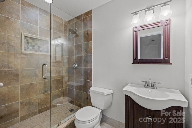 6713 William Harry Ct, Charlotte, NC 28211 - full bathroom featuring a shower stall, toilet, vanity, and baseboards