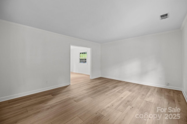 6713 William Harry Ct, Charlotte, NC 28211 - unfurnished room with ornamental molding, hardwood / wood-style flooring, and baseboards