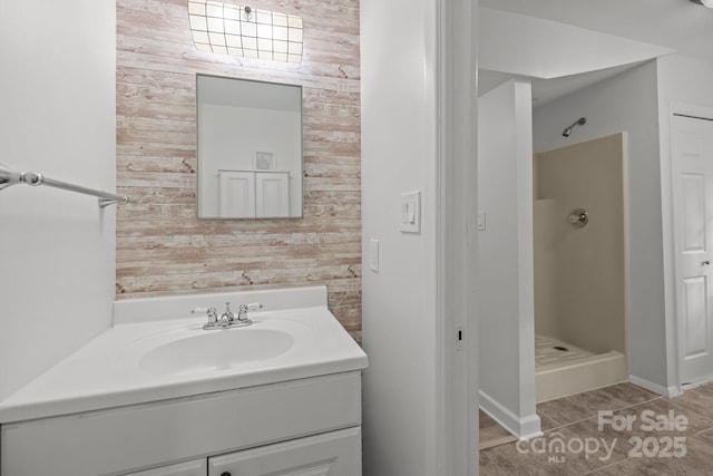 6713 William Harry Ct, Charlotte, NC 28211 - full bathroom with a stall shower, vanity, tile patterned floors, and wood walls