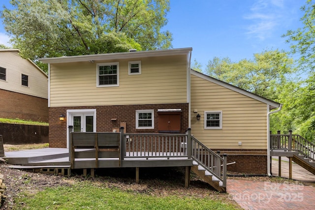 6713 William Harry Ct, Charlotte, NC 28211 - rear view of house featuring stairs, a wooden deck, and brick siding