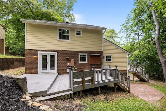 6713 William Harry Ct, Charlotte, NC 28211 - rear view of property featuring french doors, brick siding, stairs, and a wooden deck
