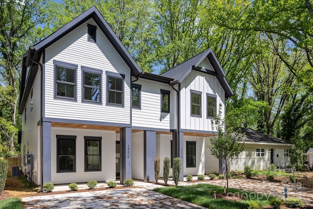 2006 St John St, Charlotte, NC 28216 - view of front of property featuring a porch and board and batten siding
