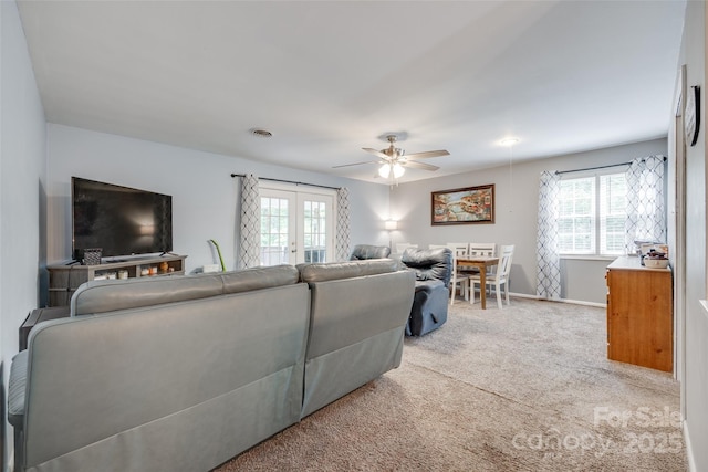 679 Fairforest Rd, Chester, SC 29706 - living area featuring carpet flooring, baseboards, french doors, and a ceiling fan