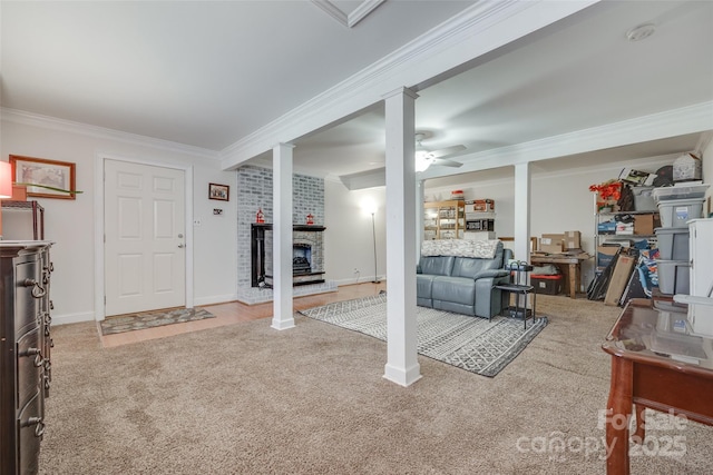 679 Fairforest Rd, Chester, SC 29706 - basement featuring carpet, crown molding, a brick fireplace, a ceiling fan, and baseboards