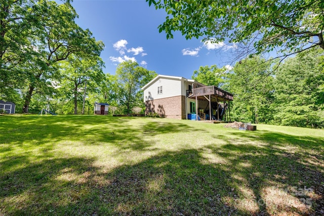 679 Fairforest Rd, Chester, SC 29706 - view of yard featuring a deck, an outbuilding, and a shed