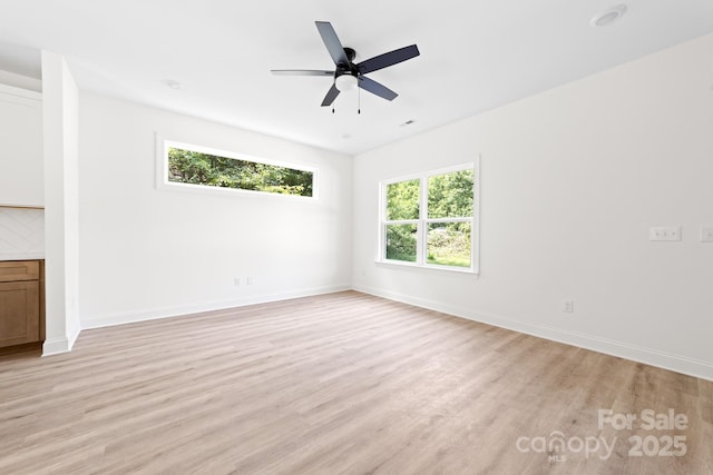 413 Jose St, Shelby, NC 28150 - empty room with light wood finished floors, baseboards, and a ceiling fan
