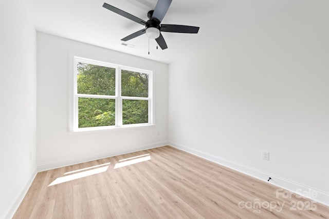 413 Jose St, Shelby, NC 28150 - spare room featuring light wood-style floors, ceiling fan, and baseboards