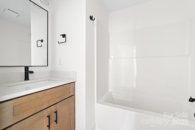 413 Jose St, Shelby, NC 28150 - bathroom featuring vanity, shower / washtub combination, and baseboards