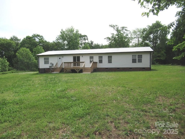 3315 Buffalo Shoals Rd, Newton, NC 28658 - view of front facade with crawl space, a deck, a front lawn, and metal roof