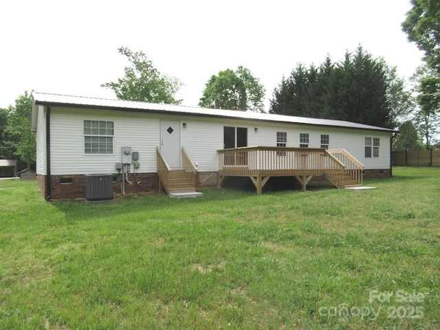 3315 Buffalo Shoals Rd, Newton, NC 28658 - rear view of house with crawl space, a wooden deck, cooling unit, entry steps, and a lawn
