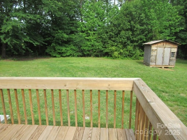 3315 Buffalo Shoals Rd, Newton, NC 28658 - wooden terrace with a storage unit, an outdoor structure, and a yard