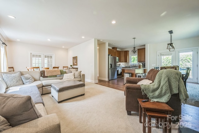 274 Old Bristol Rd, Boone, NC 28607 - living room with light colored carpet, recessed lighting, baseboards, and light wood-style floors