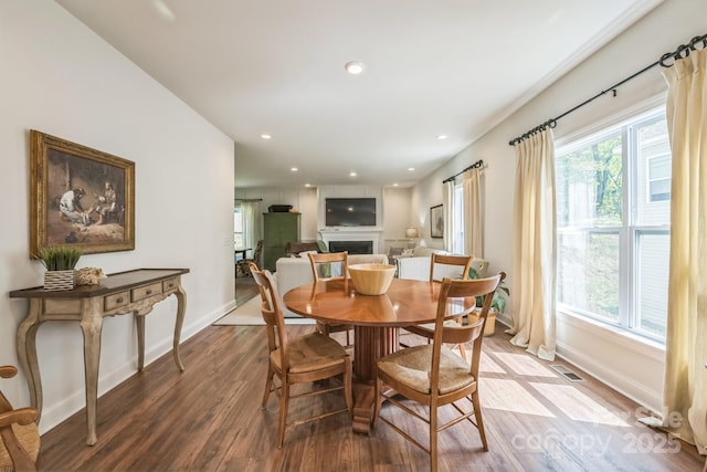 274 Old Bristol Rd, Boone, NC 28607 - dining area featuring baseboards, a fireplace, wood finished floors, and recessed lighting