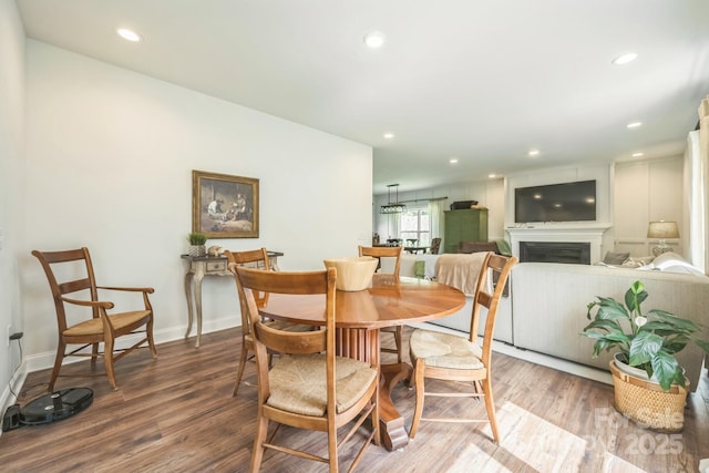 274 Old Bristol Rd, Boone, NC 28607 - dining space featuring wood finished floors, recessed lighting, baseboards, and a fireplace