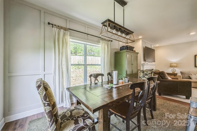 274 Old Bristol Rd, Boone, NC 28607 - dining room with dark wood-style flooring, a decorative wall, recessed lighting, and baseboards
