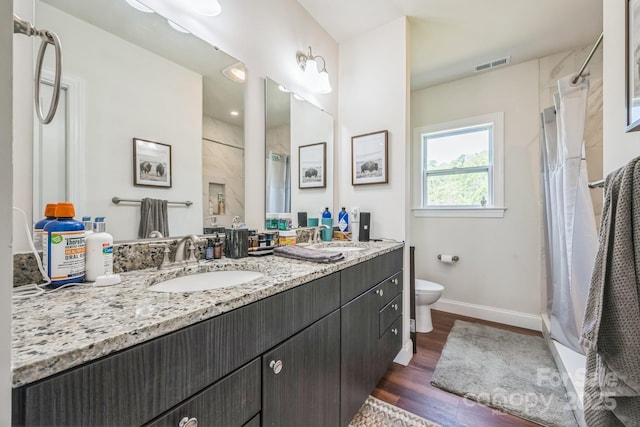 274 Old Bristol Rd, Boone, NC 28607 - full bath featuring toilet, curtained shower, wood finished floors, and baseboards