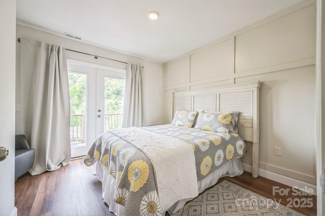 274 Old Bristol Rd, Boone, NC 28607 - bedroom featuring access to exterior, wood finished floors, and french doors