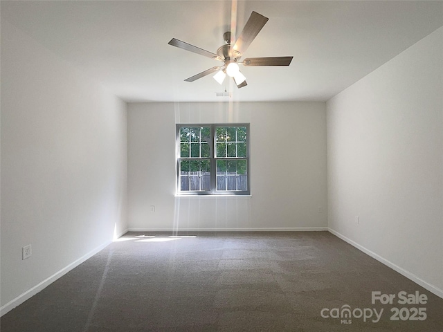 unfurnished room featuring visible vents, baseboards, ceiling fan, and carpet floors