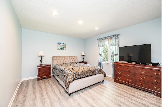 3520 4th Street Blvd NW, Hickory, NC 28601 - bedroom with light wood-style flooring, baseboards, and recessed lighting