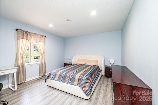 3520 4th Street Blvd NW, Hickory, NC 28601 - bedroom featuring wood finished floors, recessed lighting, and baseboards