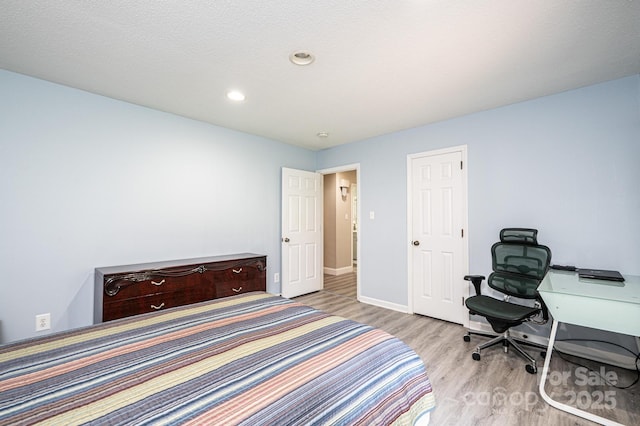 3520 4th Street Blvd NW, Hickory, NC 28601 - bedroom featuring wood finished floors, baseboards, and recessed lighting