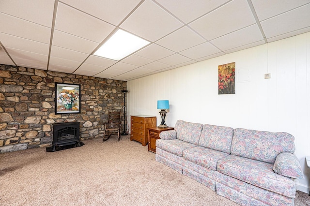 3520 4th Street Blvd NW, Hickory, NC 28601 - carpeted living area with a wood stove and a paneled ceiling
