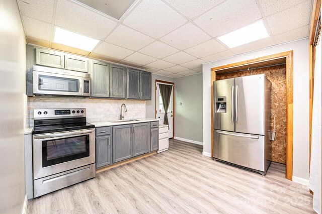 3520 4th Street Blvd NW, Hickory, NC 28601 - kitchen with appliances with stainless steel finishes, a paneled ceiling, light wood-type flooring, and a sink