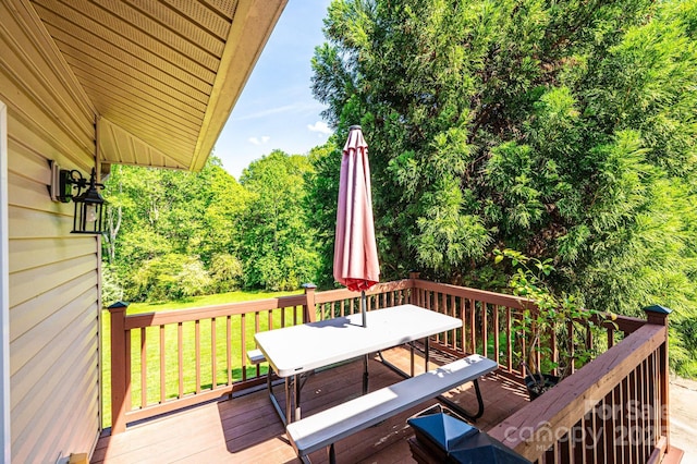 3520 4th Street Blvd NW, Hickory, NC 28601 - deck with outdoor dining area and a lawn