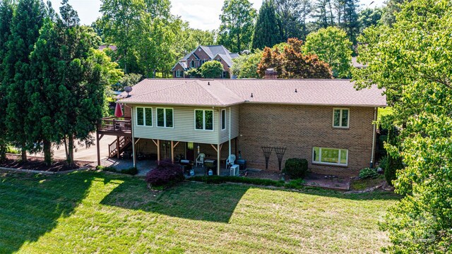 3520 4th Street Blvd NW, Hickory, NC 28601 - back of house featuring a patio area, stairs, a deck, and a lawn