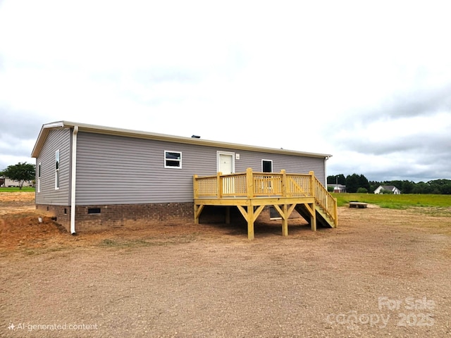 104 Advent Dr, Grover, NC 28073 - back of house with a wooden deck and crawl space