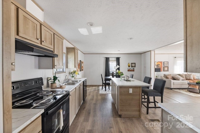 104 Advent Dr, Grover, NC 28073 - kitchen featuring black range with electric stovetop, a sink, under cabinet range hood, dark wood-type flooring, and a textured ceiling