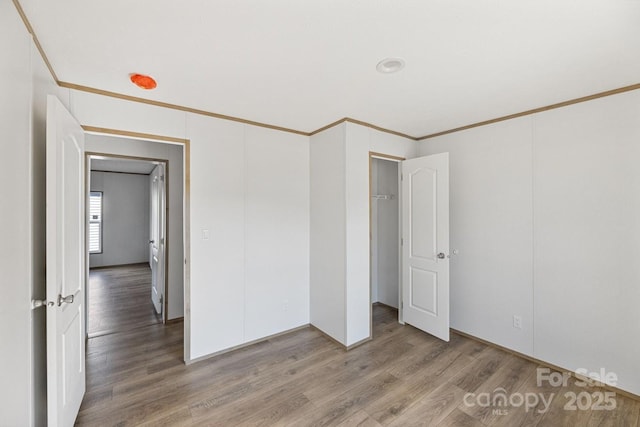 104 Advent Dr, Grover, NC 28073 - unfurnished bedroom featuring crown molding and wood finished floors