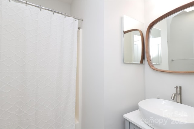 10217 Falling Leaf Dr, Concord, NC 28027 - full bathroom featuring vanity and a shower with curtain