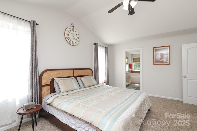 10217 Falling Leaf Dr, Concord, NC 28027 - bedroom with lofted ceiling, carpet floors, baseboards, a ceiling fan, and ensuite bath