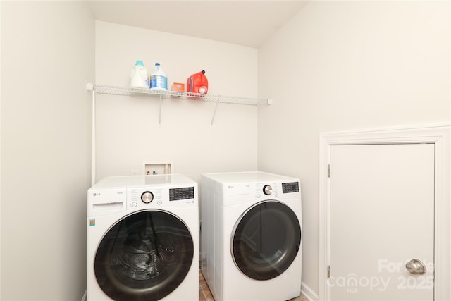 10217 Falling Leaf Dr, Concord, NC 28027 - washroom featuring washing machine and clothes dryer