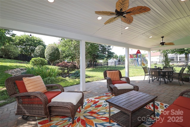 10217 Falling Leaf Dr, Concord, NC 28027 - view of patio / terrace with ceiling fan, a playground, and outdoor dining area