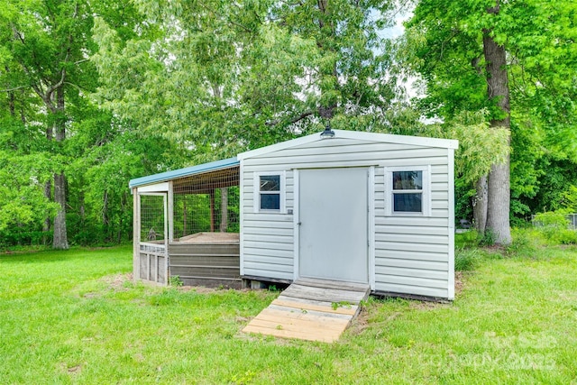 view of outbuilding featuring an outdoor structure