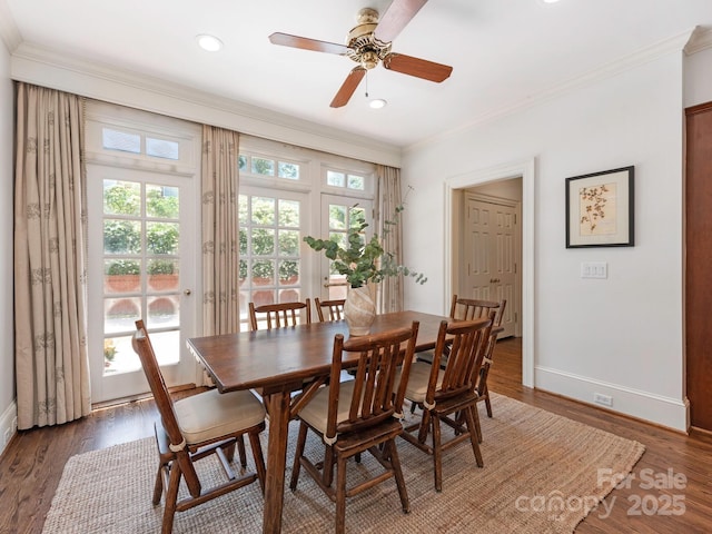 dining room with baseboards, ornamental molding, ceiling fan, wood finished floors, and recessed lighting