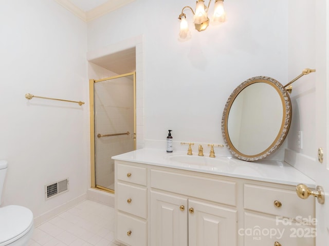 bathroom featuring toilet, a stall shower, tile patterned flooring, vanity, and a chandelier