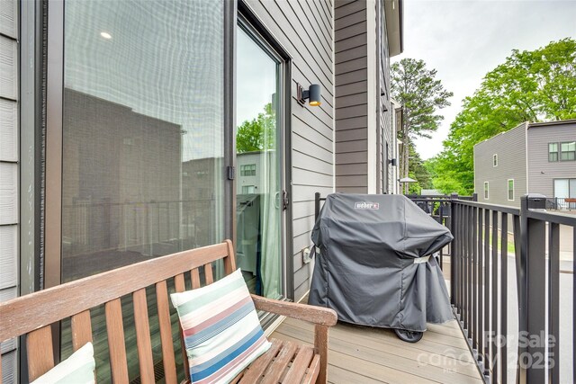 deck featuring a grill